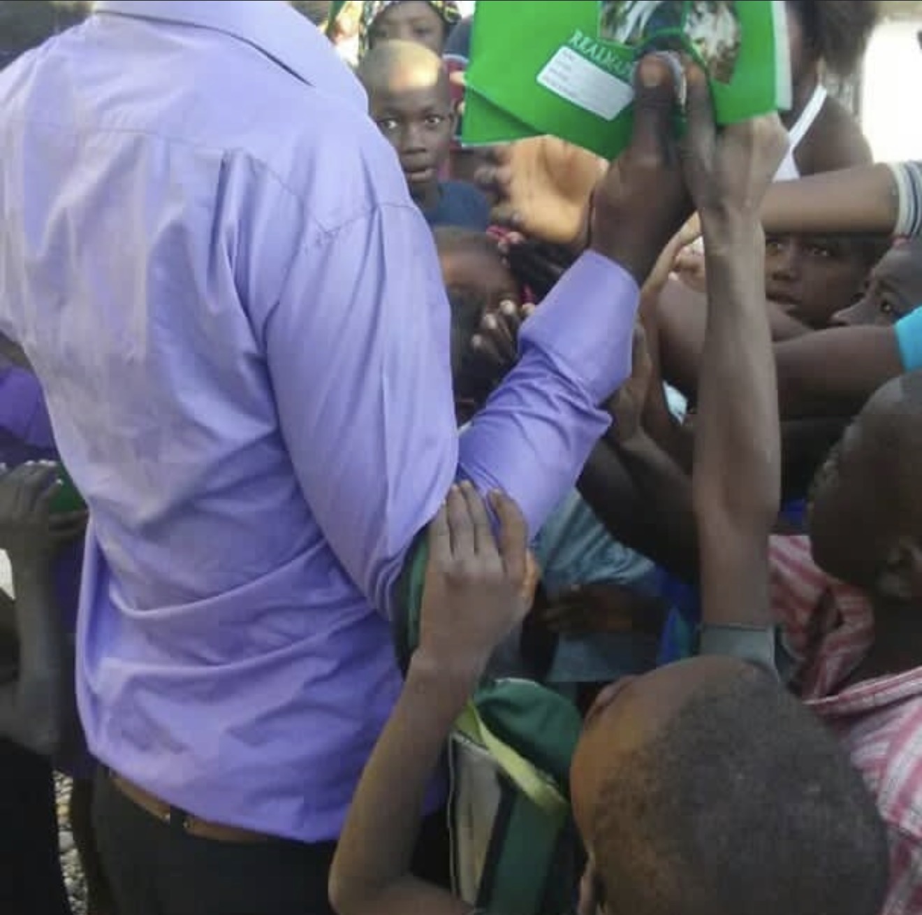 Distributing supplies to children